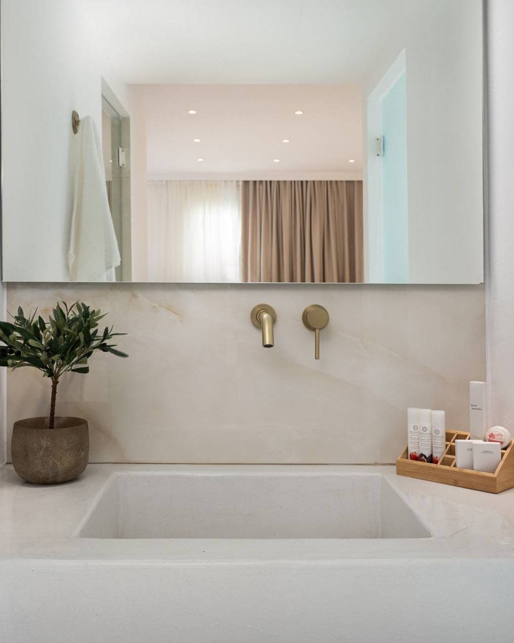 Bathroom vanity in pale stone