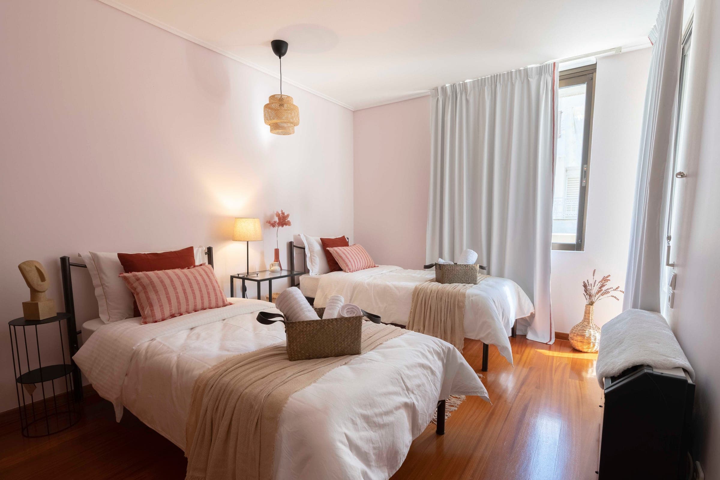 Bedroom with a rattan pendant